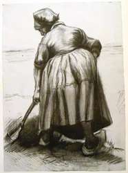 後ろから見た農民を掘る